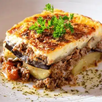 Traditional Moussaka recipe with eggplants (aubergines) and potatoes