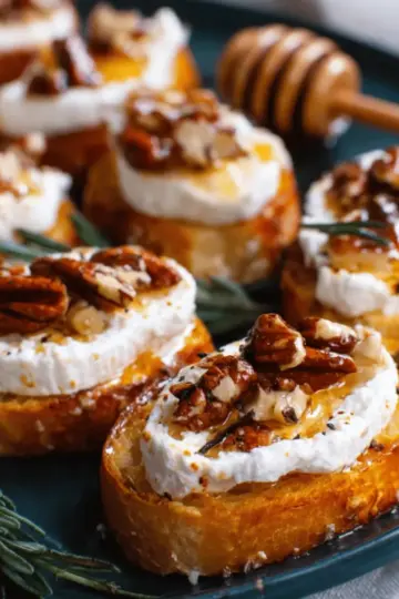 Whipped Feta Crostinis with Hot Honey and Pecans