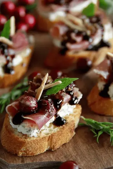 Cranberry, Brie and Prosciutto Crostini with Balsamic Glaze